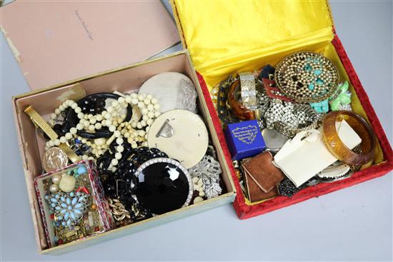 Three boxes of assorted costume jewellery.